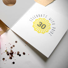 Load image into Gallery viewer, Inside an age 30 card. the inside reads 'Celebrate with pride' and the number is withing a yellow sunshine in the centre. The words are arching over the top.