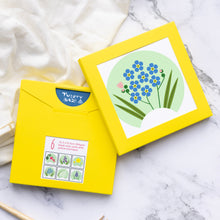 Load image into Gallery viewer, Forget me not card showing through the front of the box. The second box shows the back picturing the options in the selection