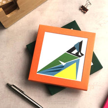 Load image into Gallery viewer, Orange box of greetings cards with geometric bird design