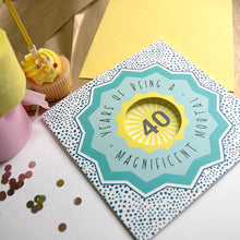Load image into Gallery viewer, 40th birthday card with decorative elements on a table