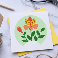 Greeting card with floral design on a marble surface