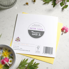 Load image into Gallery viewer, Back of Greetings card with a passion flower on the front. The card has a circle cut out on the front. this pictures the barcode and FSC logo.
