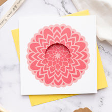 Load image into Gallery viewer, Card with pink floral design on a yellow envelope against a marble background