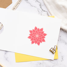 Load image into Gallery viewer, Floral stamp on a white card with a yellow envelope on a marble surface