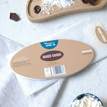 Load image into Gallery viewer, Back of Chocolate eclair card on a marble surface surrounded by baking ingredients.