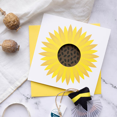 Card with a yellow sunflower design on a white background
