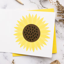 Load image into Gallery viewer, Card with a yellow sunflower design on a marble surface