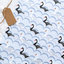 Load image into Gallery viewer, Pattern of black swans on a white background with a brown tag.