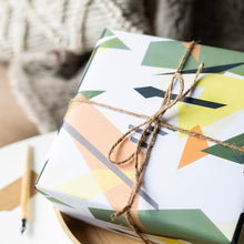 Load image into Gallery viewer, Gift box with geometric pattern and string, blurred background