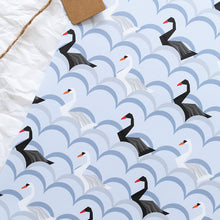 Load image into Gallery viewer, Pattern of black and white swans on a blue wave background